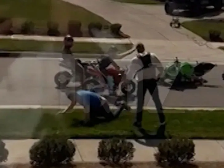 Alan Ritchson and Ronnie Taylor engaged in a street confrontation.