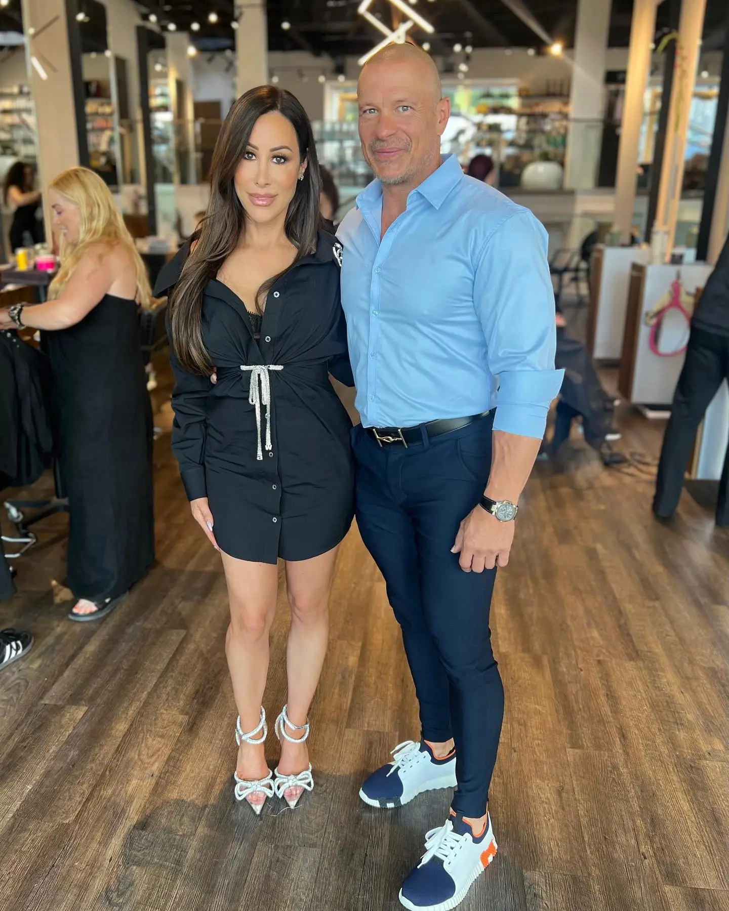 Angie Katsanevas and Shawn Trujillo standing together.