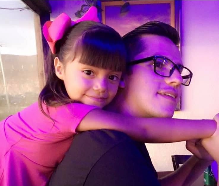 Armando Niedermeier-Rubio smiling with his daughter Hannah.