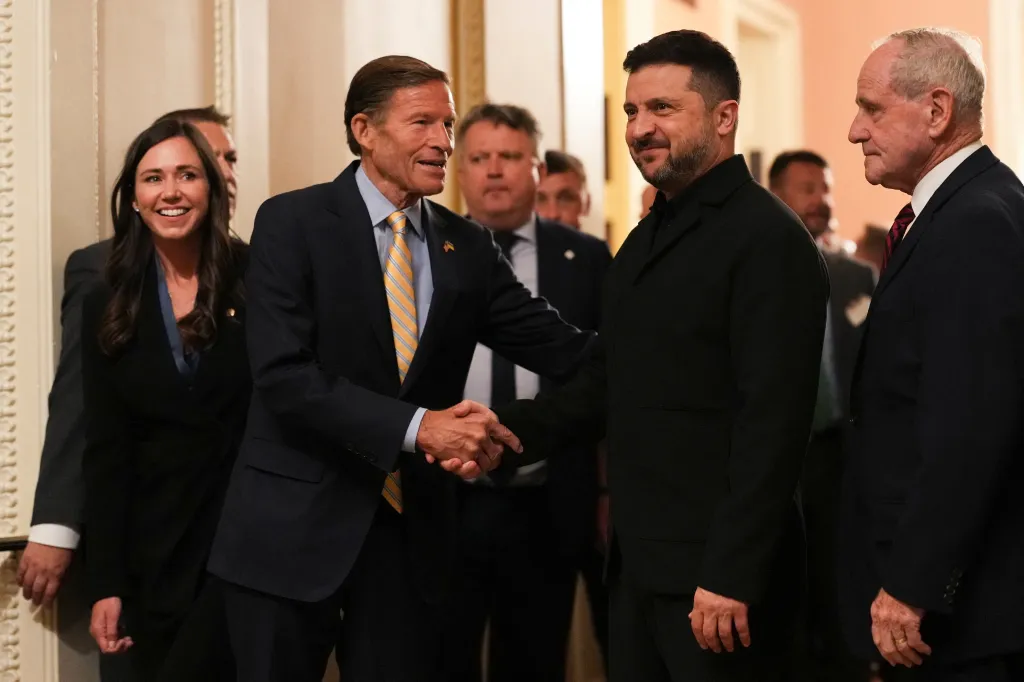 Ukraine's President Volodymyr Zelenskiy shakes hands with U.S. Senator Richard Blumenthal at the U.S. Capitol.