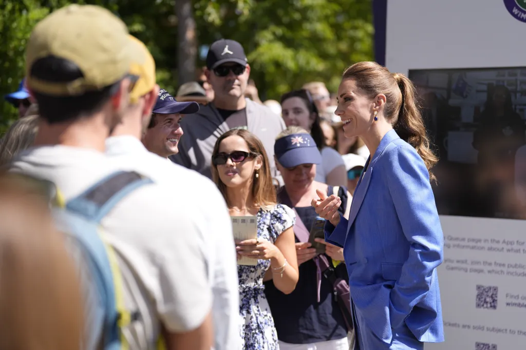 Kate, the Princess of Wales, smiles while meeting fans at the Wimbledon Tennis Championships.