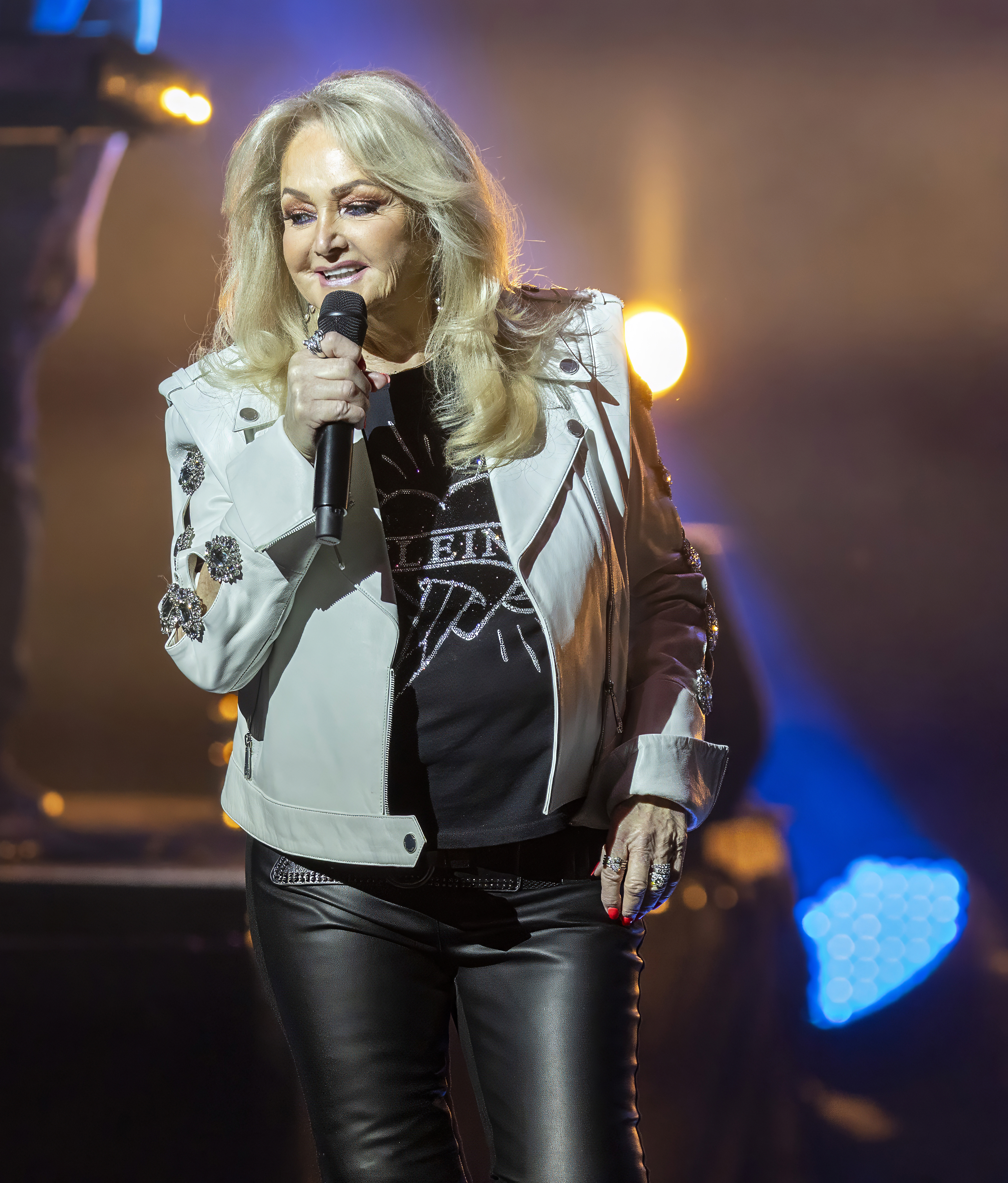 British singer Bonnie Tyler performing on stage.