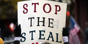 ‘It’s madness!’ Chaos at new ‘Stop the Steal’ rally as woman punched on video