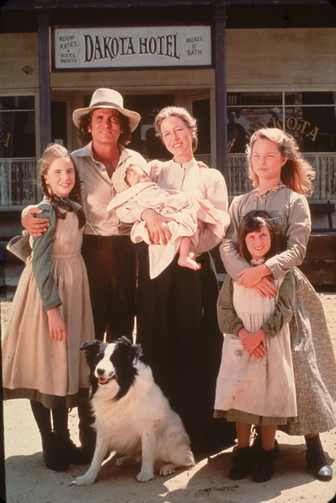 The cast of the television series 'Little House on the Prairie' on set.