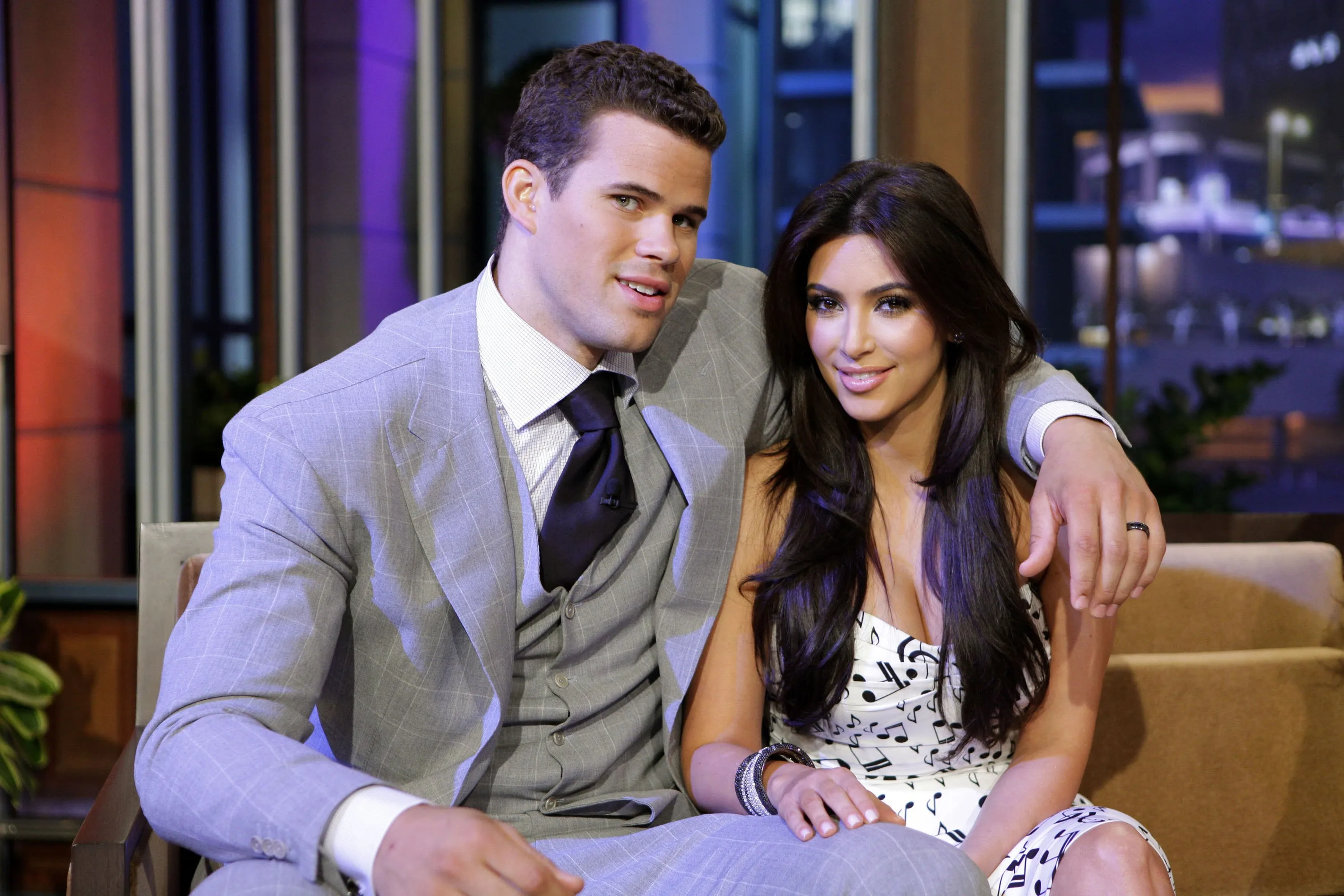 Chris Humphries and Kim Kardashian posing together during a commercial break for 