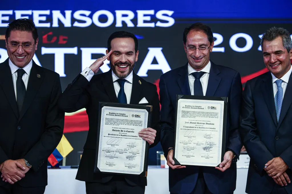 Colombia's President-elect Abelardo de la Espriella and Vice President-elect Jose Manuel Restrepo pose for a photo with their officials certificates.
