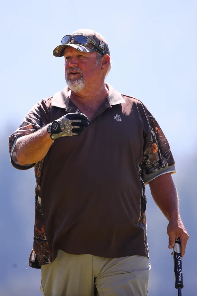 Comedian Larry the Cable Guy on a golf course.