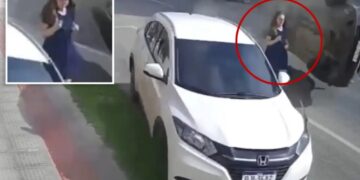 Terrifying video shows woman narrowly escape death as speeding truck plows into SUV next to her