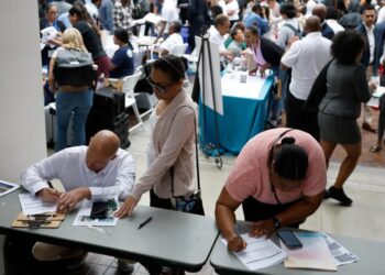 US employers add 57K jobs in June as hiring continues at a healthy clip – though rate-cut hopes fall