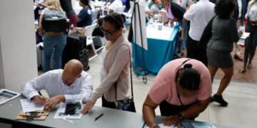 US employers add 57K jobs in June as hiring continues at a healthy clip – though rate-cut hopes fall