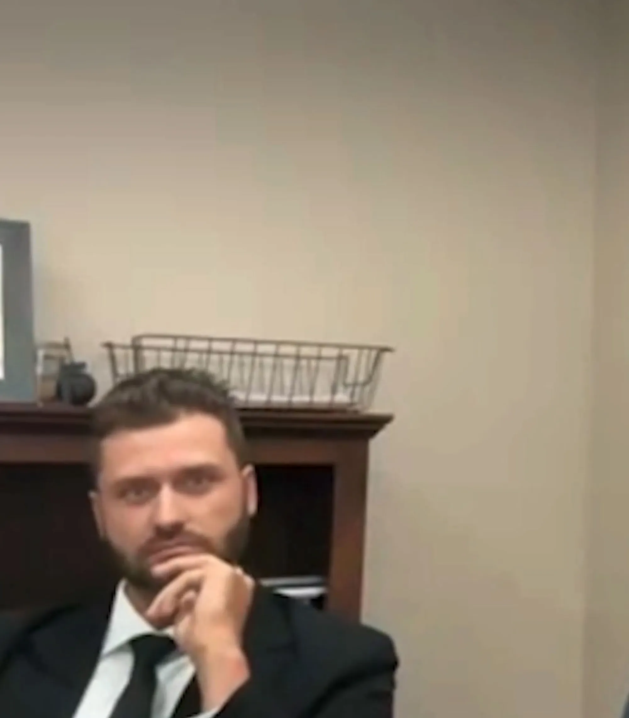 Dakota Mortensen in a suit and tie.