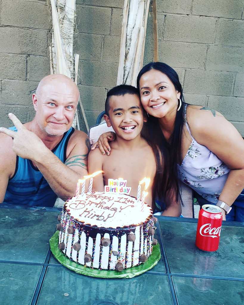 John Schwallier with Daveigh Chase and another person at a birthday celebration.