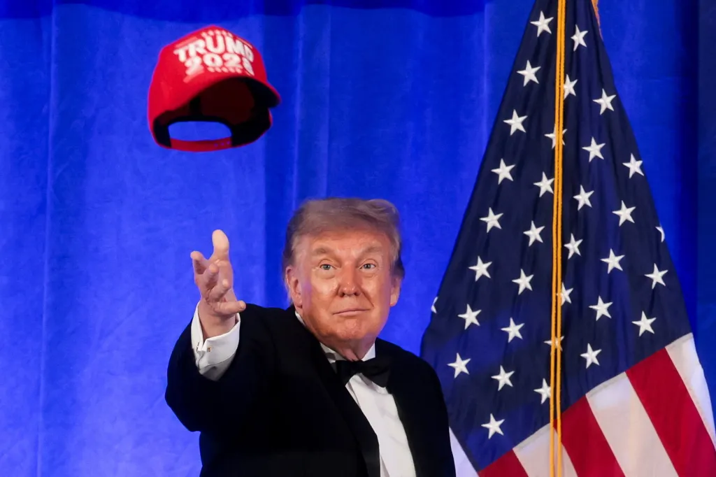 Donald Trump throwing a red