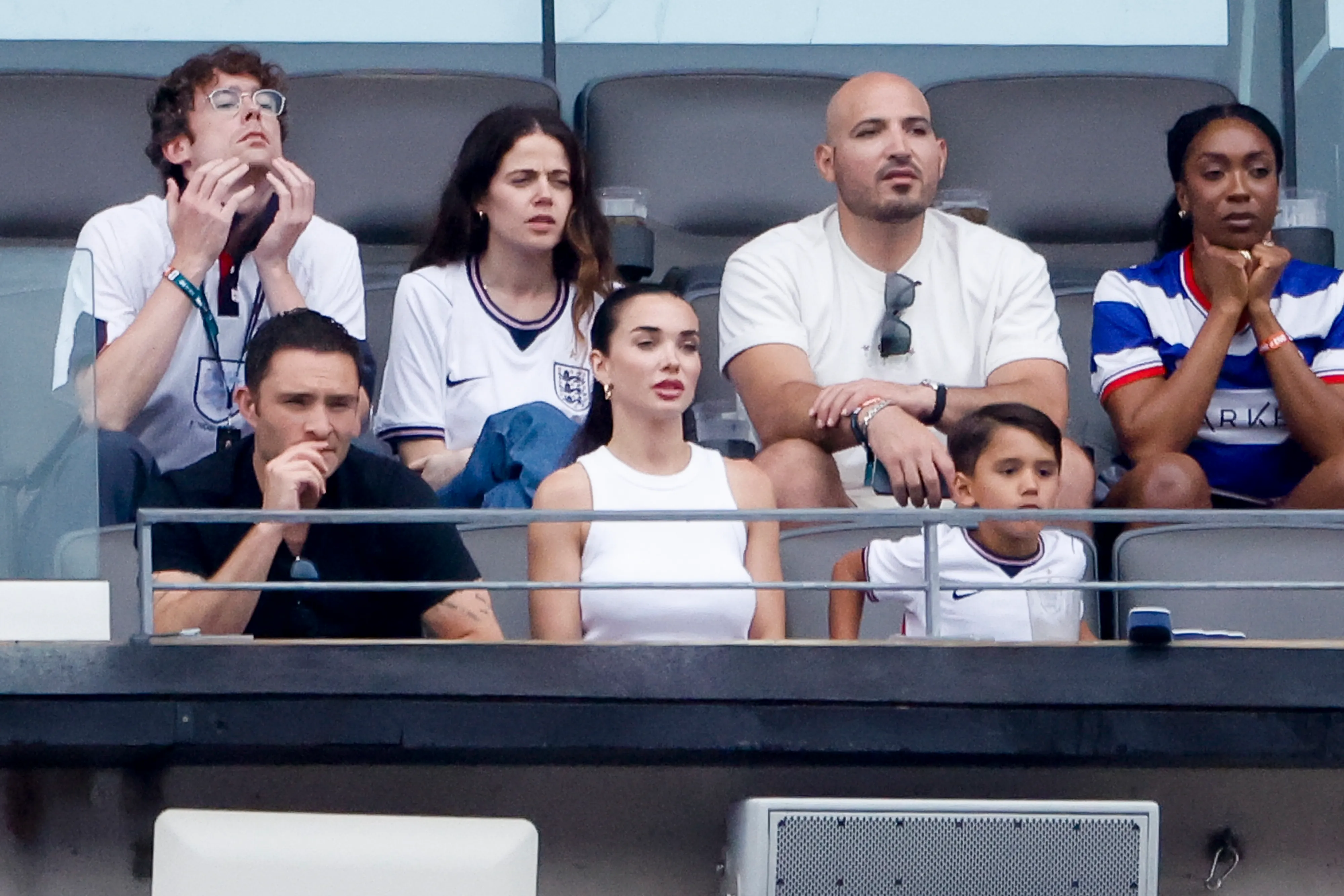 Ed Westwick, Amy Jackson Westwick, and her son watching the FIFA World Cup 2026 match.
