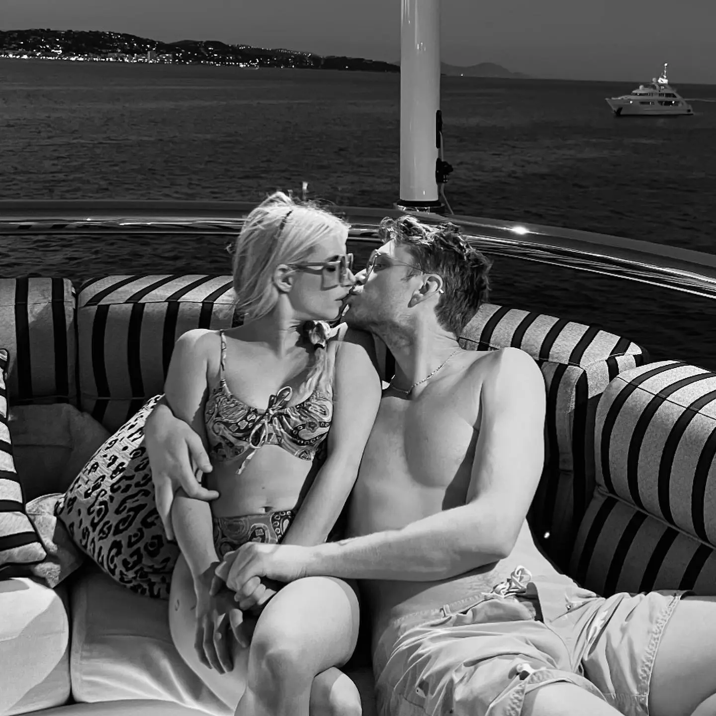 Emma Roberts and Cody John kissing on a yacht.