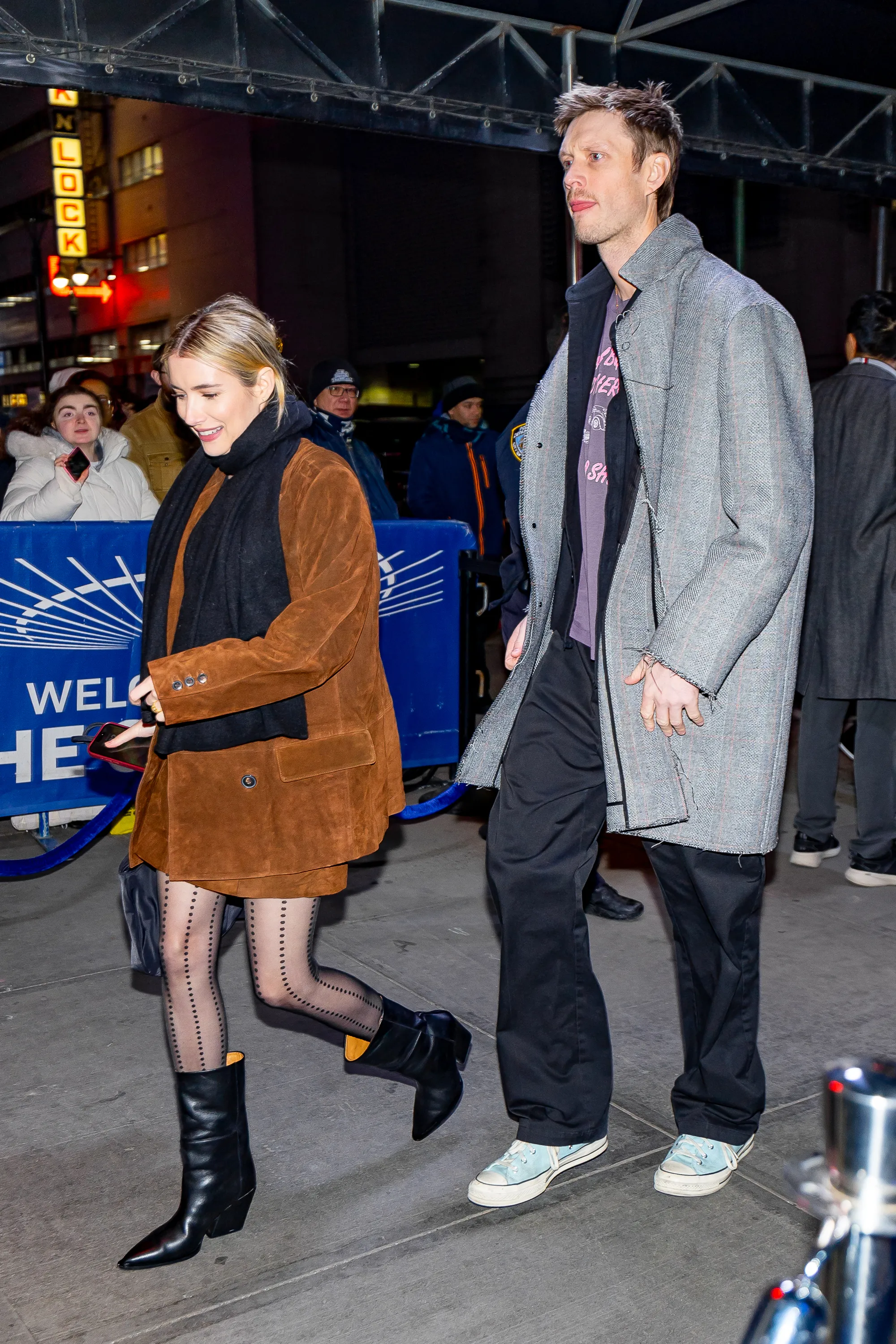 Emma Roberts and Cody John walking together in New York City.