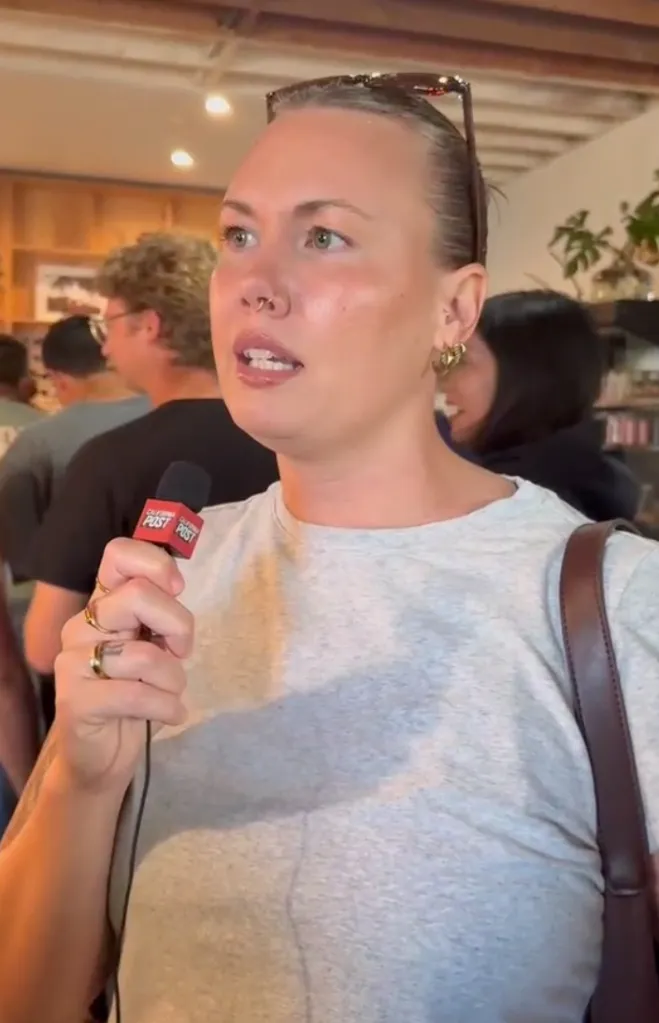 Emma Rudder speaking into a 