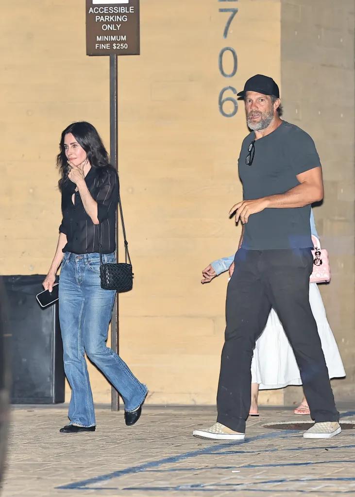 Courteney Cox and Geoff Stults walk out of Nobu after dinner.