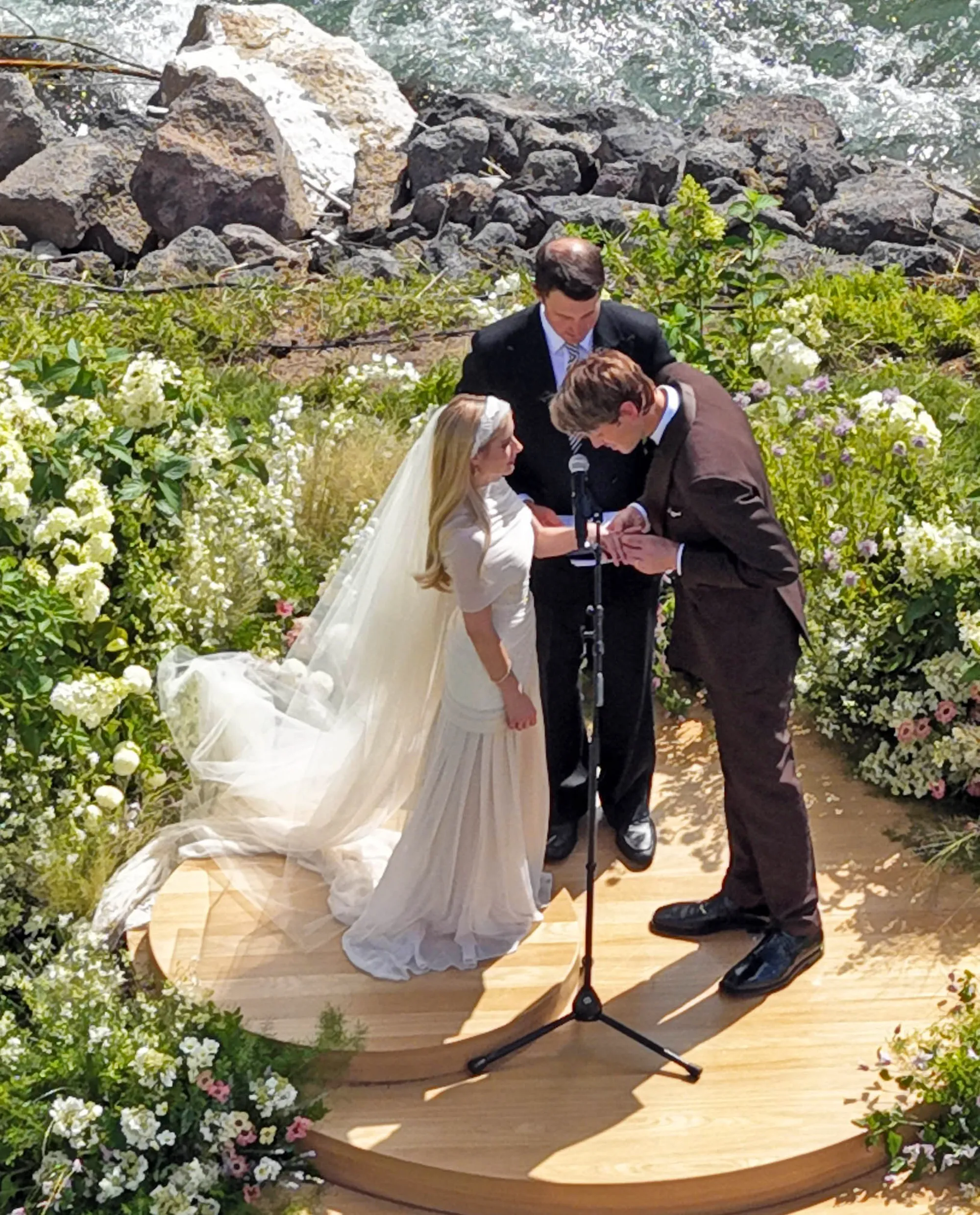 Emma Roberts and Cody John exchanging vows at their wedding ceremony.