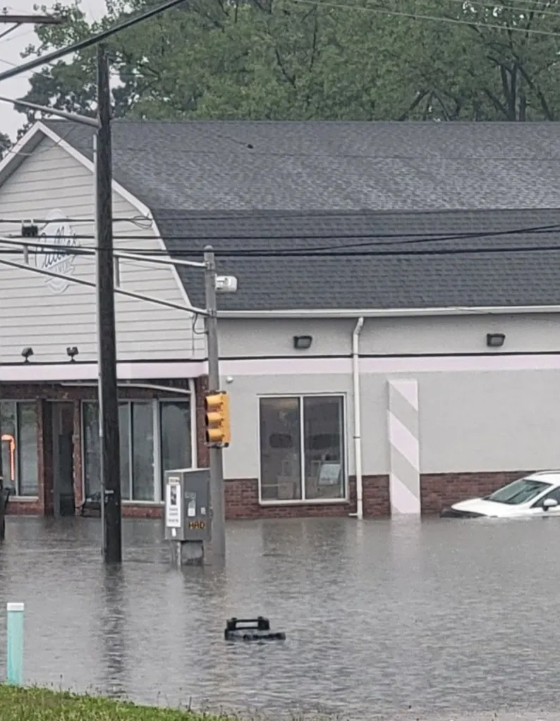 A family-owned ice cream shop in New Jersey is surrounded by floodwaters.