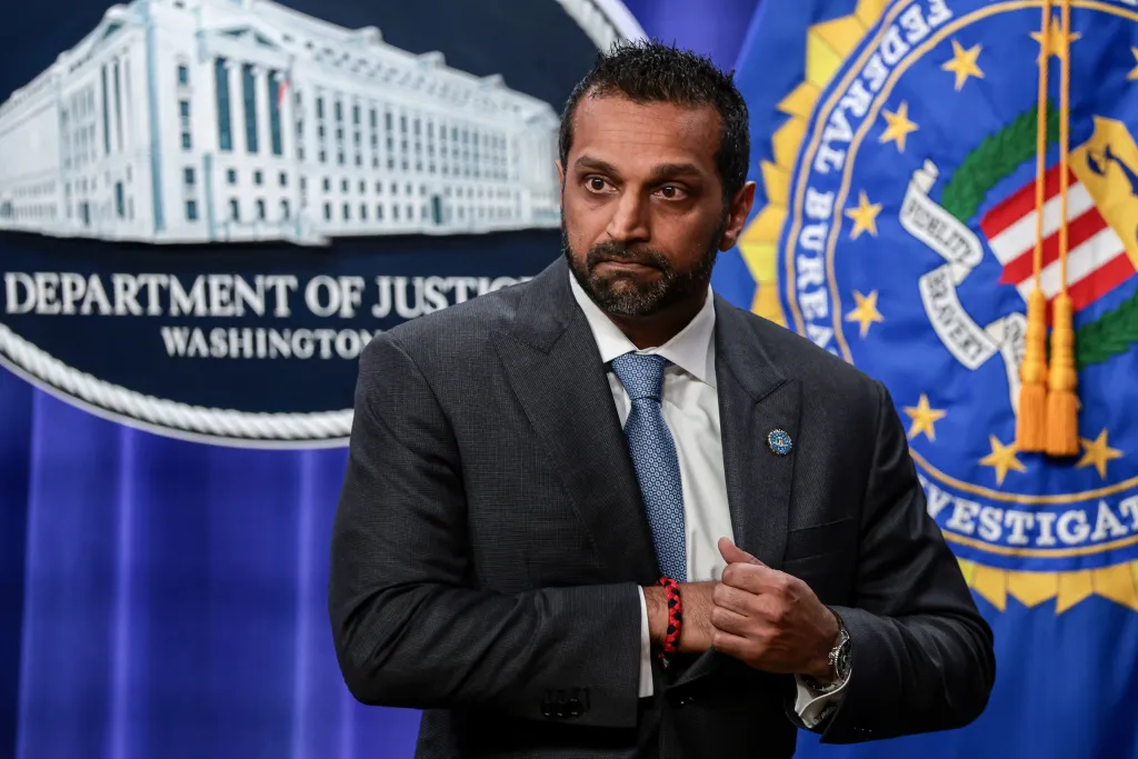 FBI Director Kash Patel speaking at a press conference.
