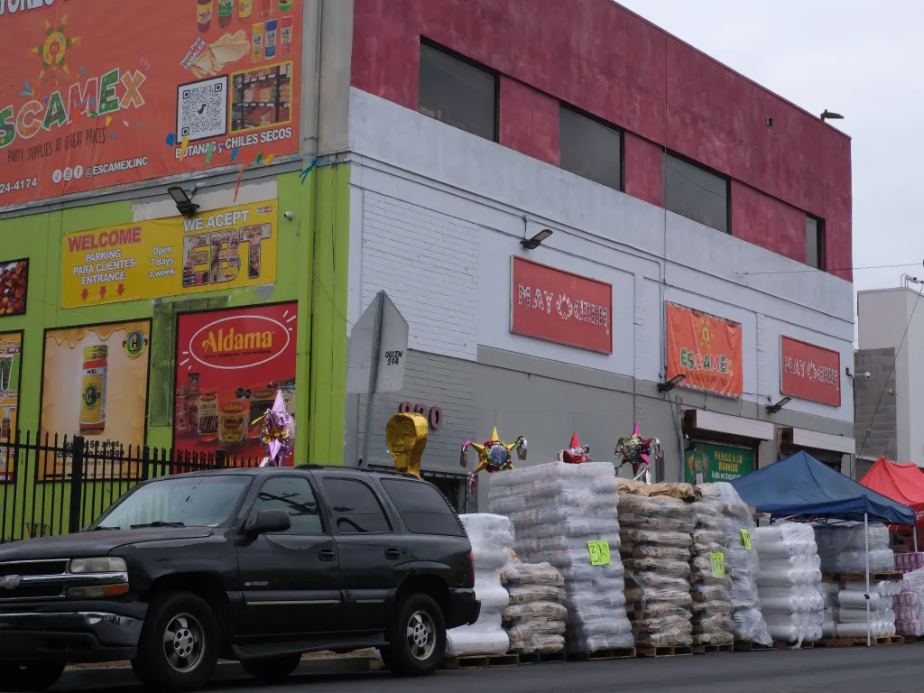 FBI and HSI agents execute a search warrant at the Escamex party supply store.
