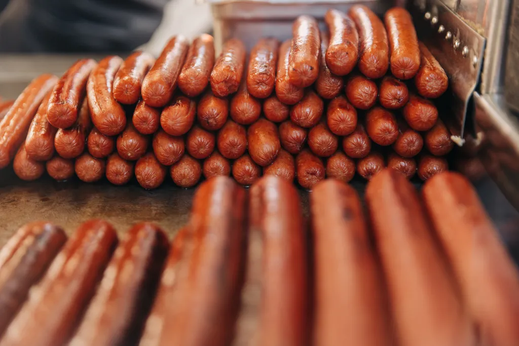 Hot dogs displayed at Dan Rossi's food cart.