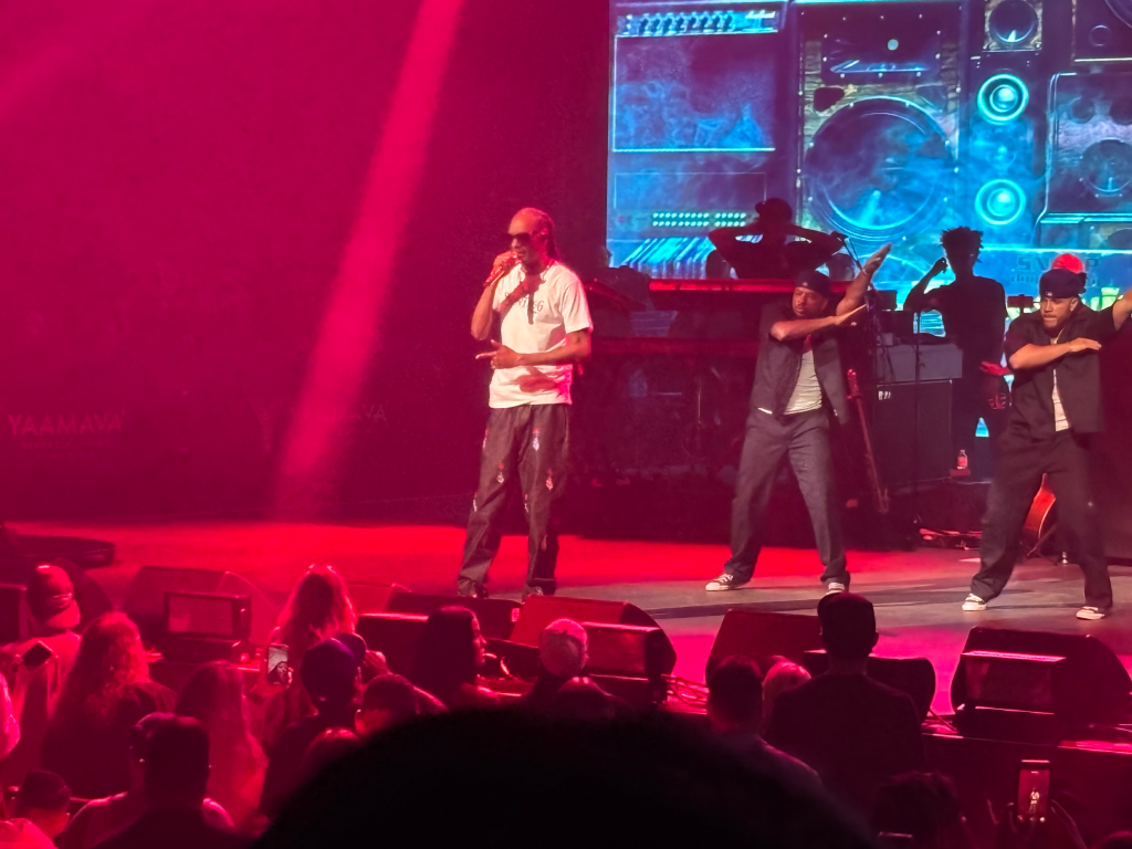 Snoop Dogg performing on stage at the Yaamava' Resort & Casino's 40th anniversary celebration.