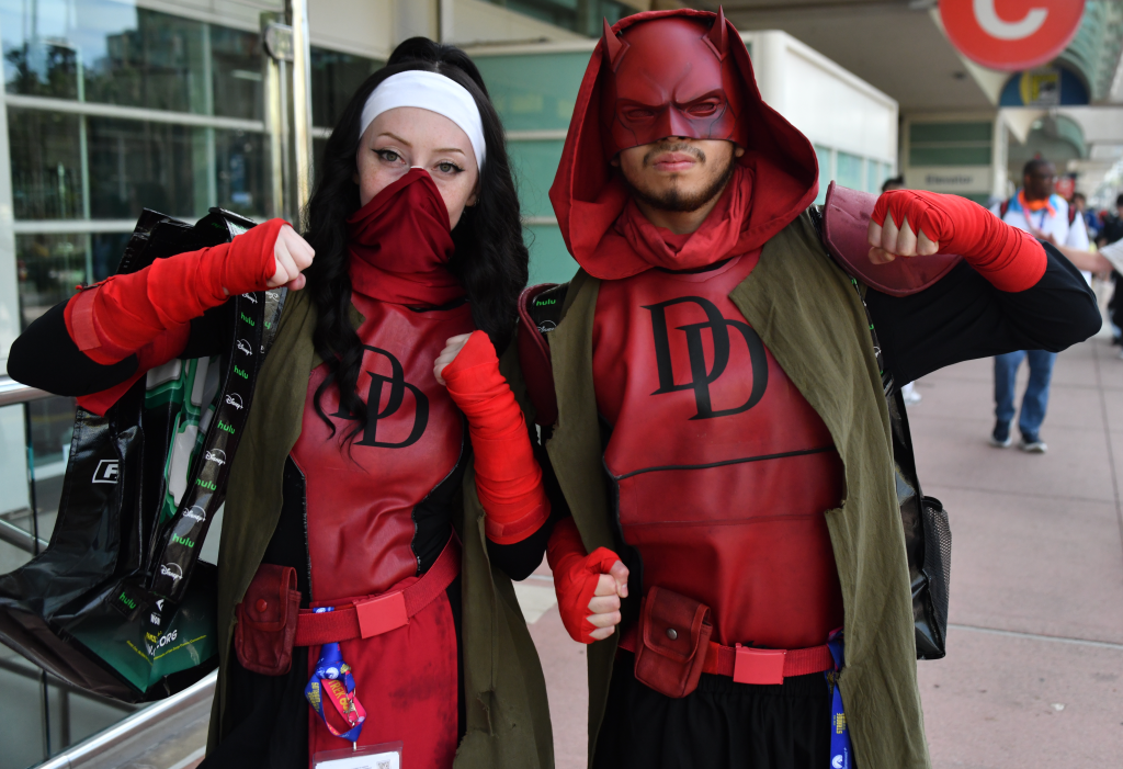 DareDevil fans post in their costumes outside the 2026 Comic-Con in San Diego.