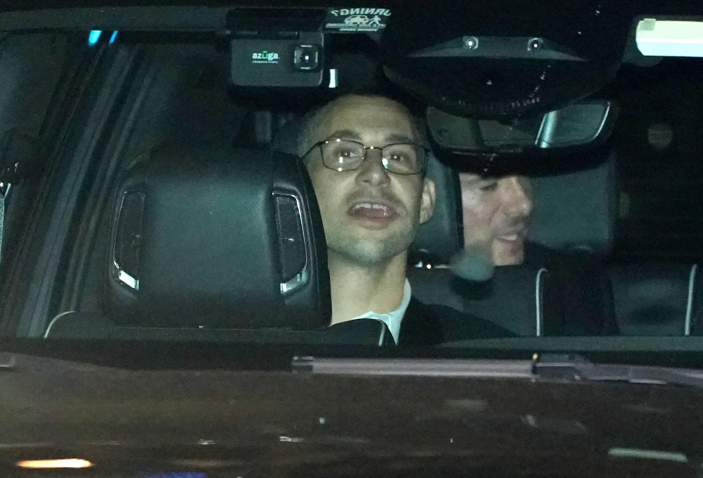 Jack Antonoff in a car leaving the wedding of Taylor Swift and Travis Kelce.