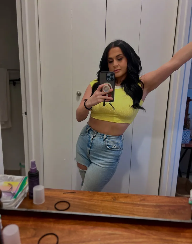 Jennifer Hyatt Tedmori taking a mirror selfie.