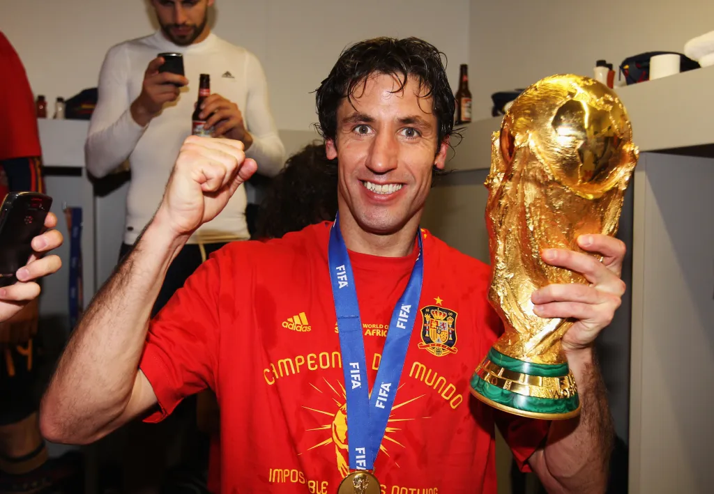 Joan Capdevila, in a red shirt with