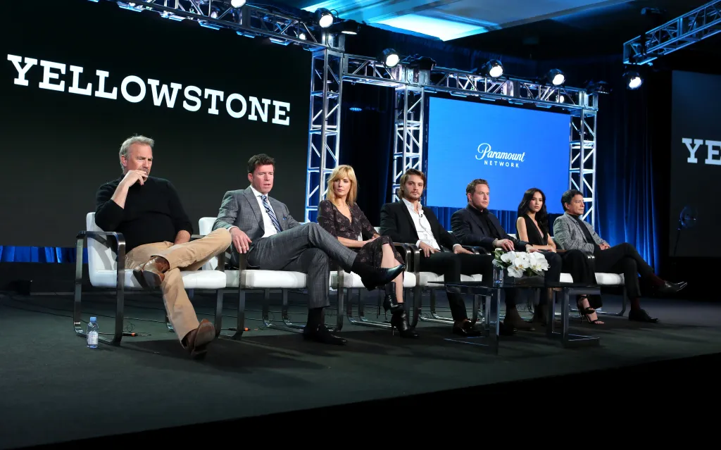 The cast of Yellowstone and show creator Taylor Sheridan at a TCA Winter Press Tour panel.