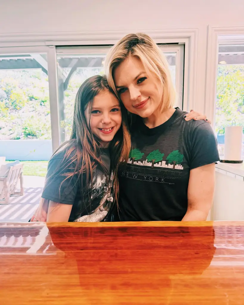 Kirsten Storms with her daughter, sharing a sweet moment indoors.