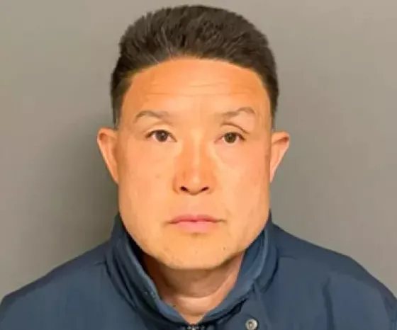 Mugshot of Kwong Chun Sit, 54, convicted of animal cruelty.