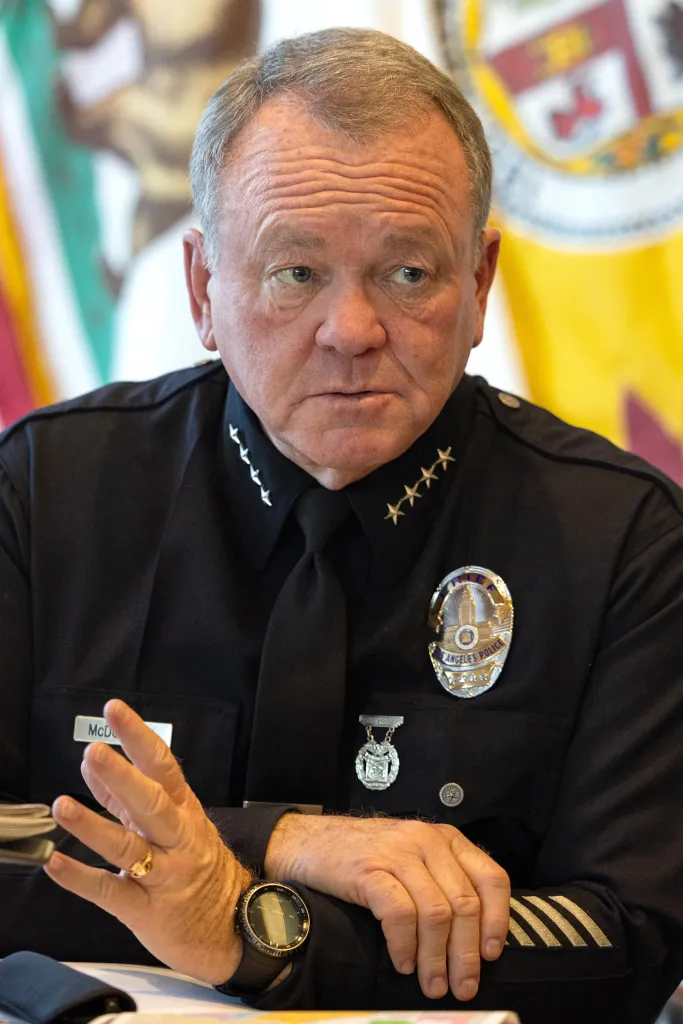 LAPD Chief Jim McDonnell speaking during an interview.