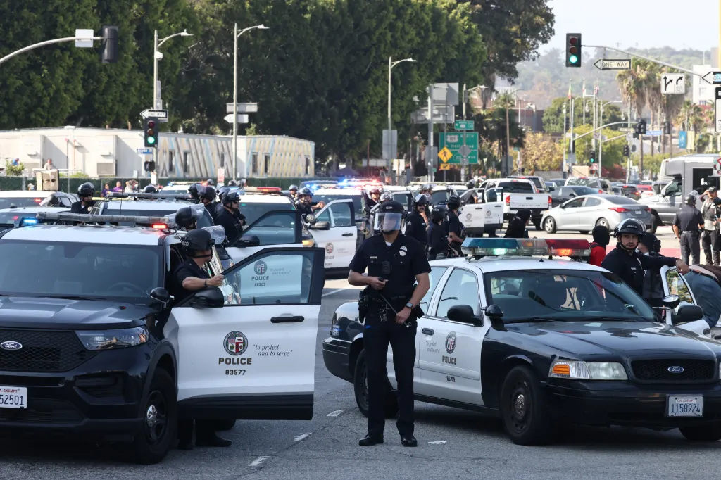 LAPD officers and police vehicles outside the Metropolitan Detention Center, Los Angeles.