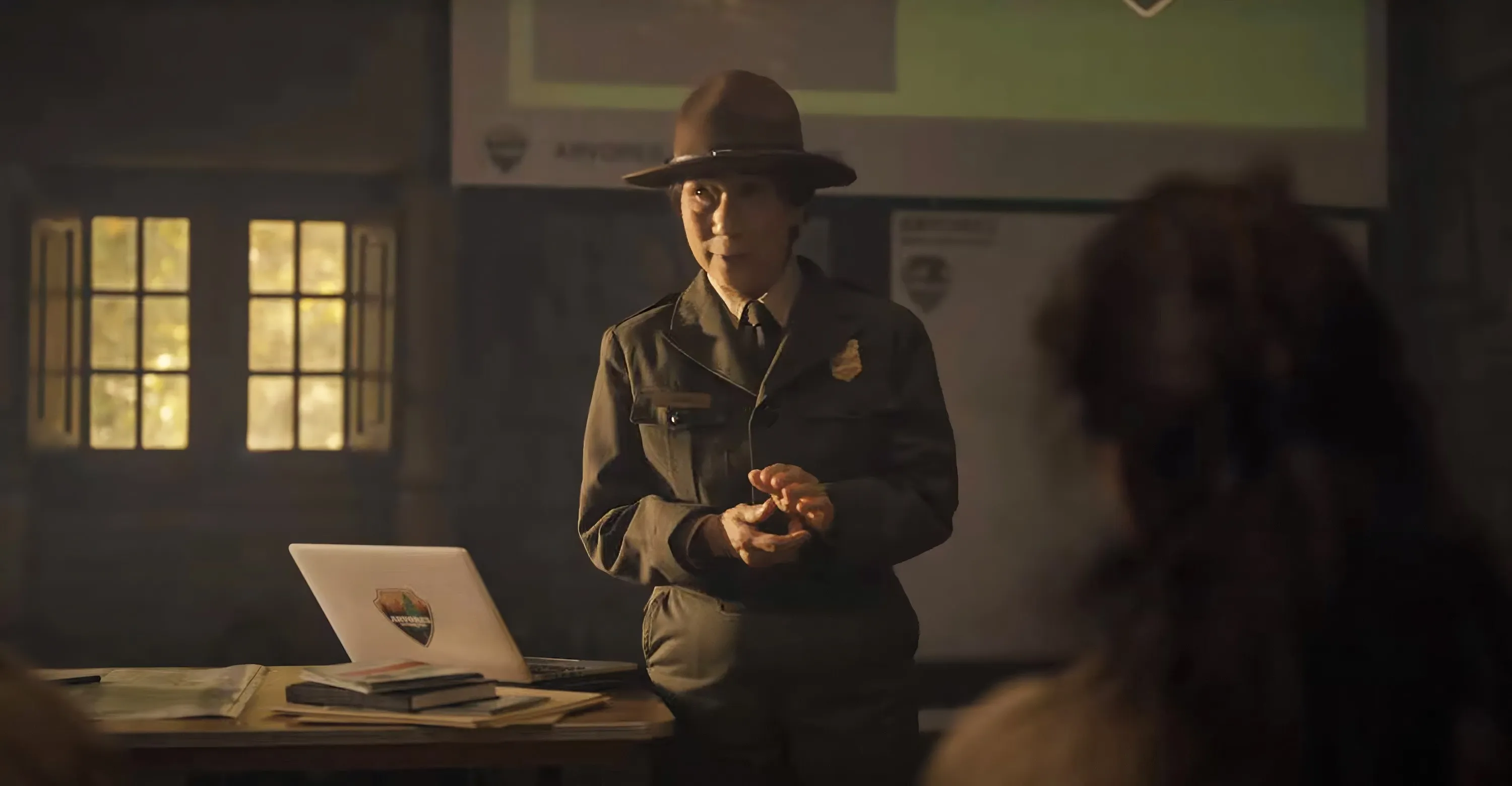 Wai Ching Ho as a park ranger speaking to a group in 