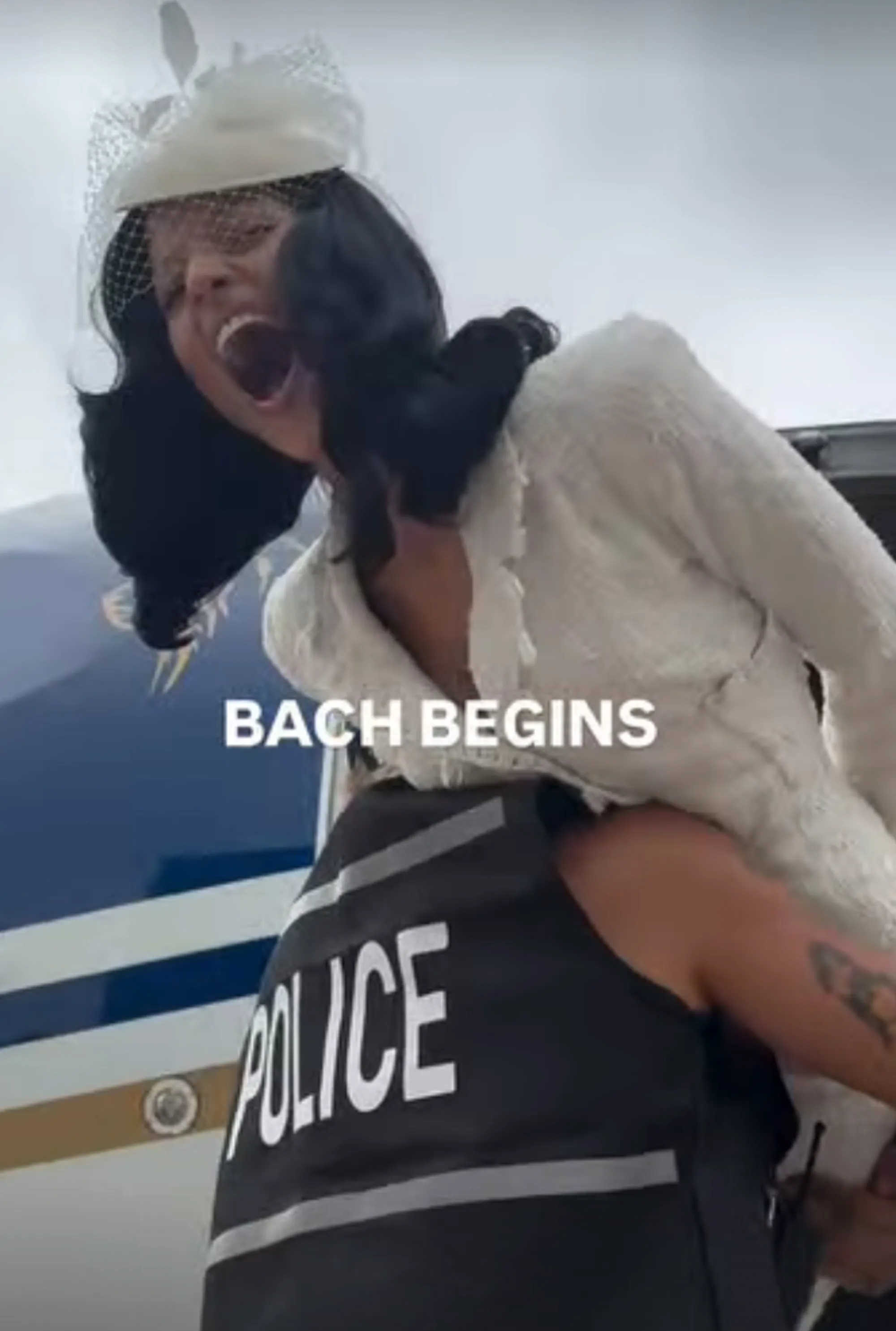 Gabriette being carried by someone in a