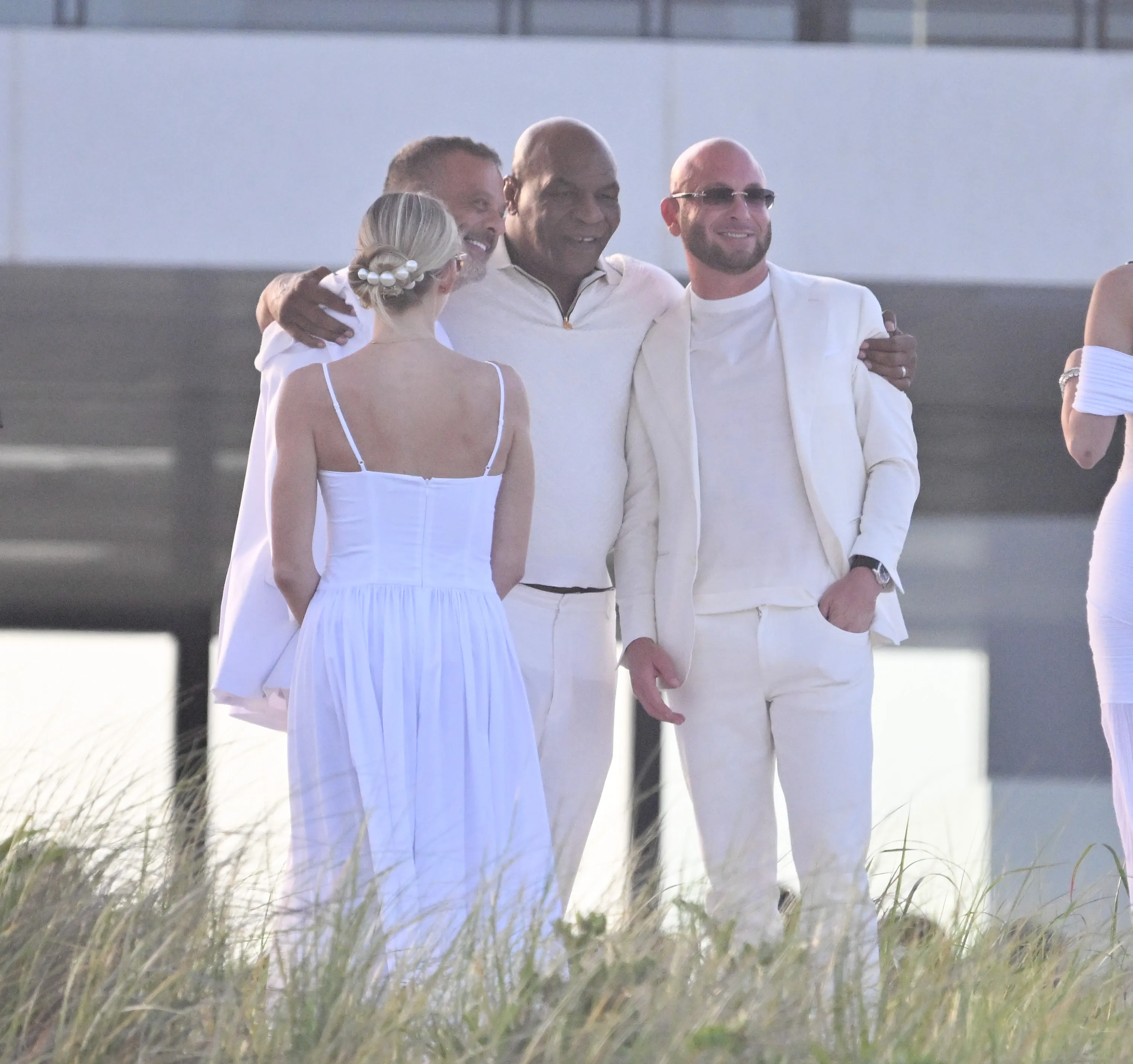 Mike Tyson (C) at Michael Rubin's All White Party.