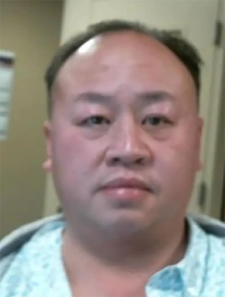 Tou Lue Vang, 42, pictured here in a mugshot.