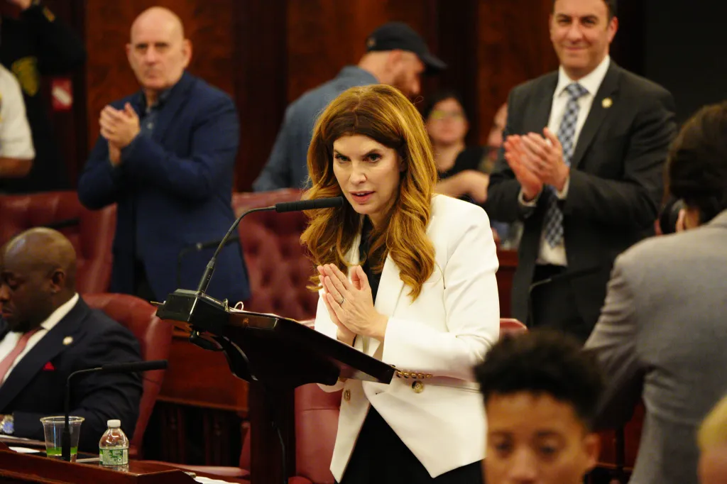 New York City Council Speaker Julie Menin speaking at a City Council meeting.