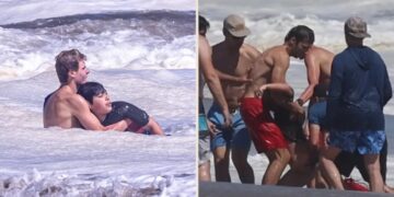 Heart-stopping moment little boy is battered by huge waves and dragged out to sea off California