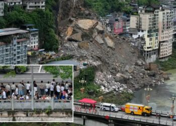 China landslide kills at least 8 as rescuers race to find survivors in rain