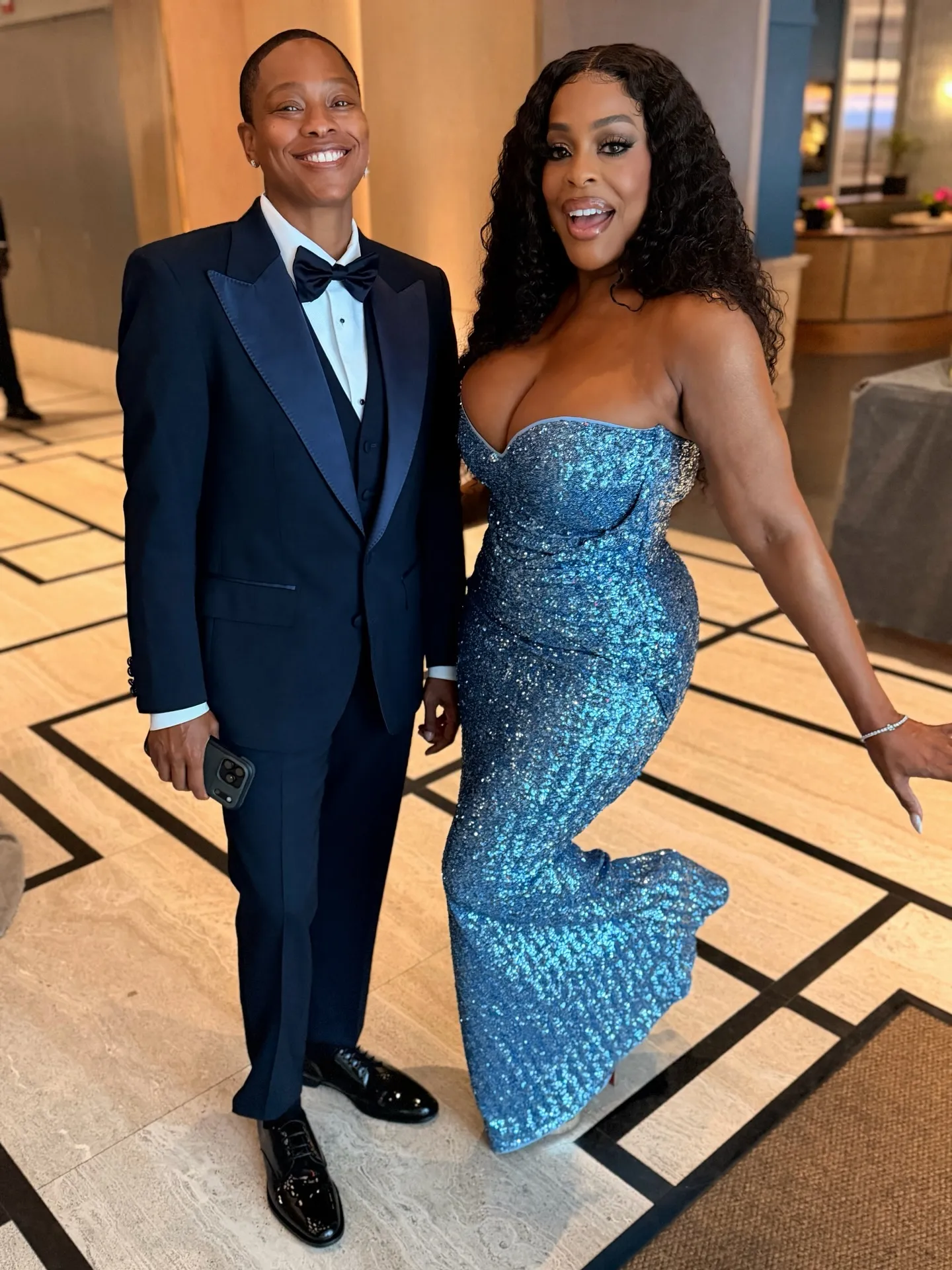 Niecy Nash and Jessica Betts posing for a photo.