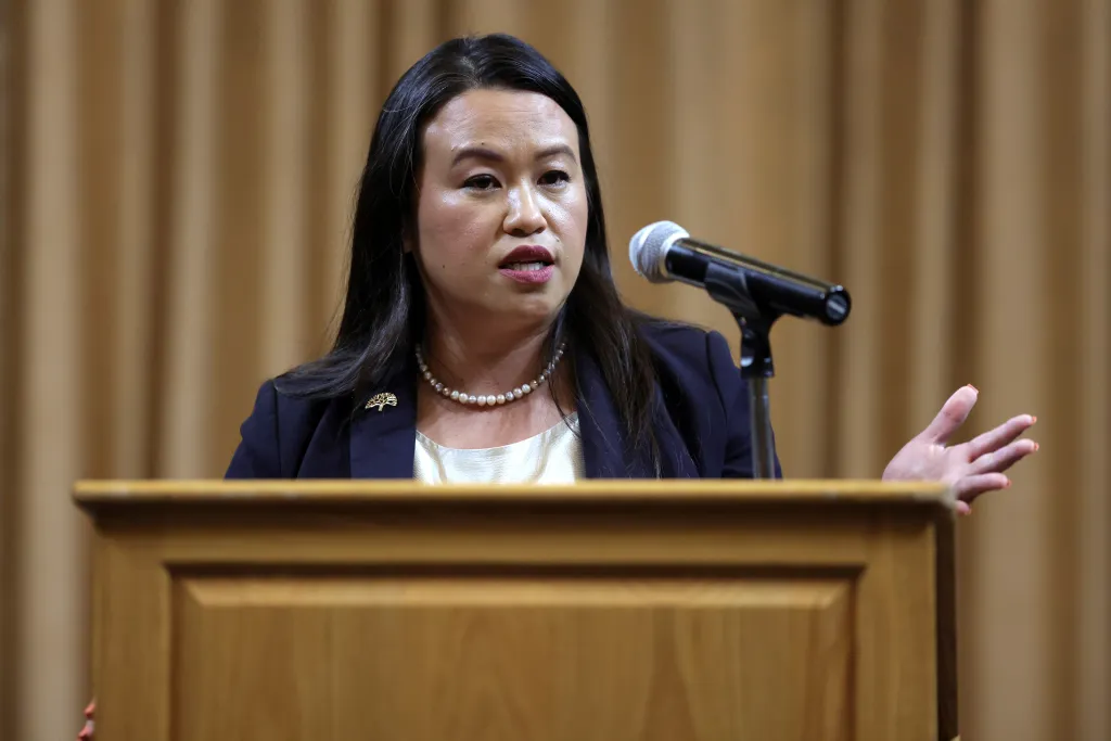 Oakland Mayor Sheng Thao speaking at a podium.