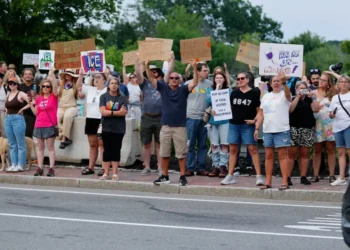 ‘Furious’ protesters descend on small Maine town after ‘horrific’ ICE killing