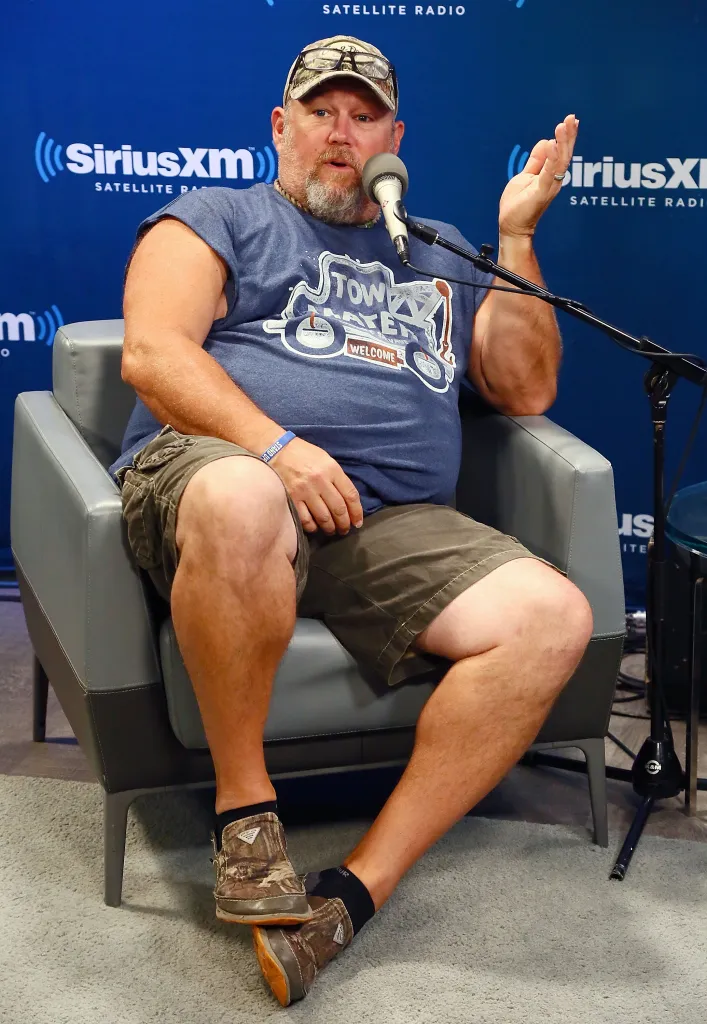 Larry the Cable Guy speaking into a microphone at a SiriusXM Town Hall.