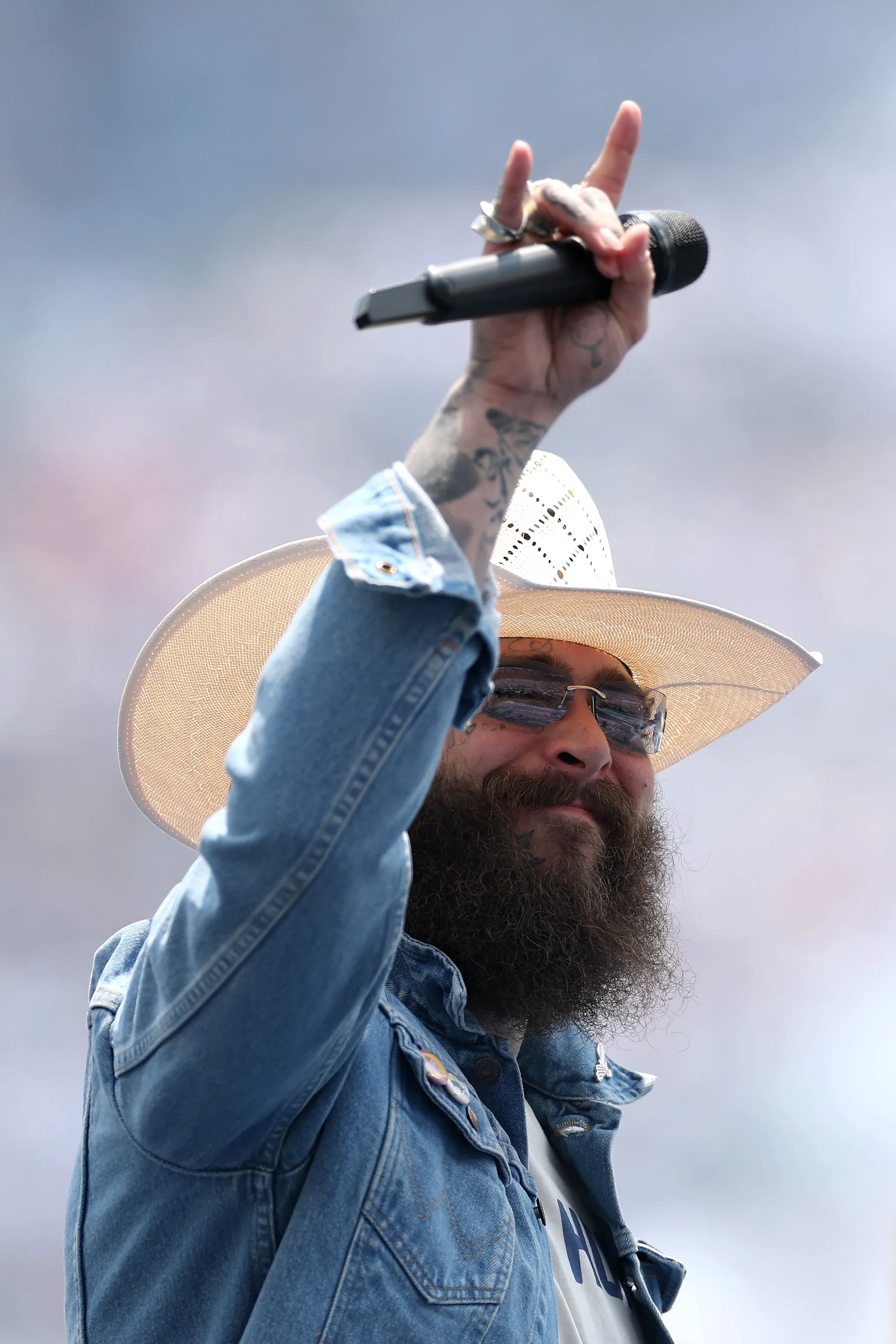 Post Malone performing during the closing ceremony before the FIFA World Cup 2026 Final match.