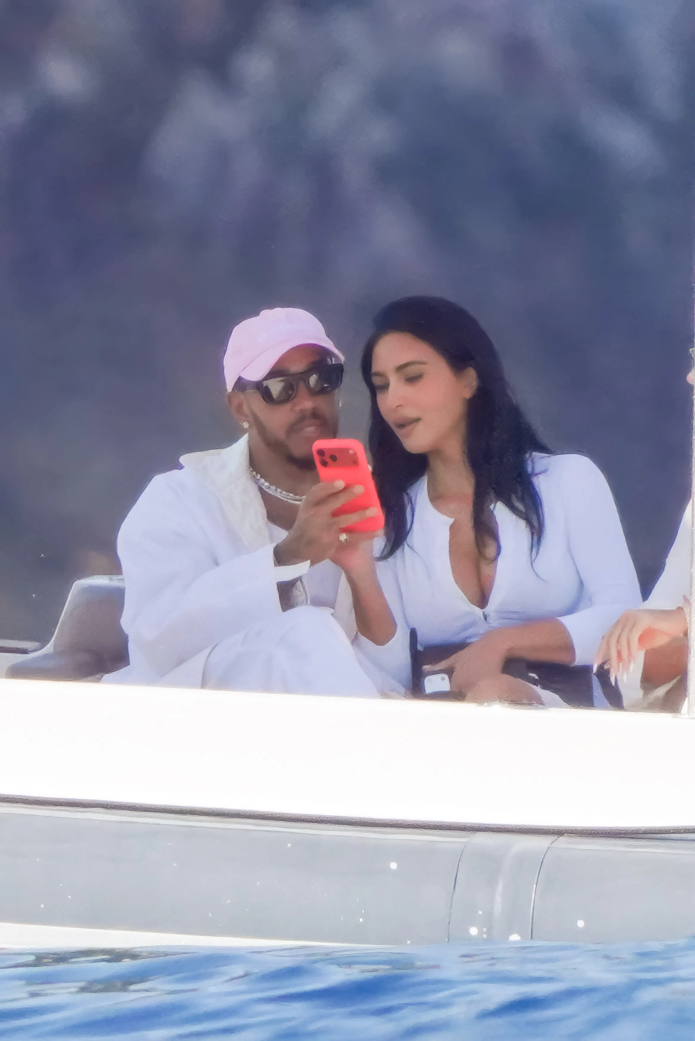 Kim Kardashian and Lewis Hamilton aboard a superyacht in Monaco.